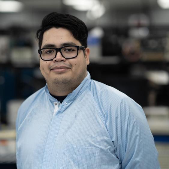 Employee poses for photo